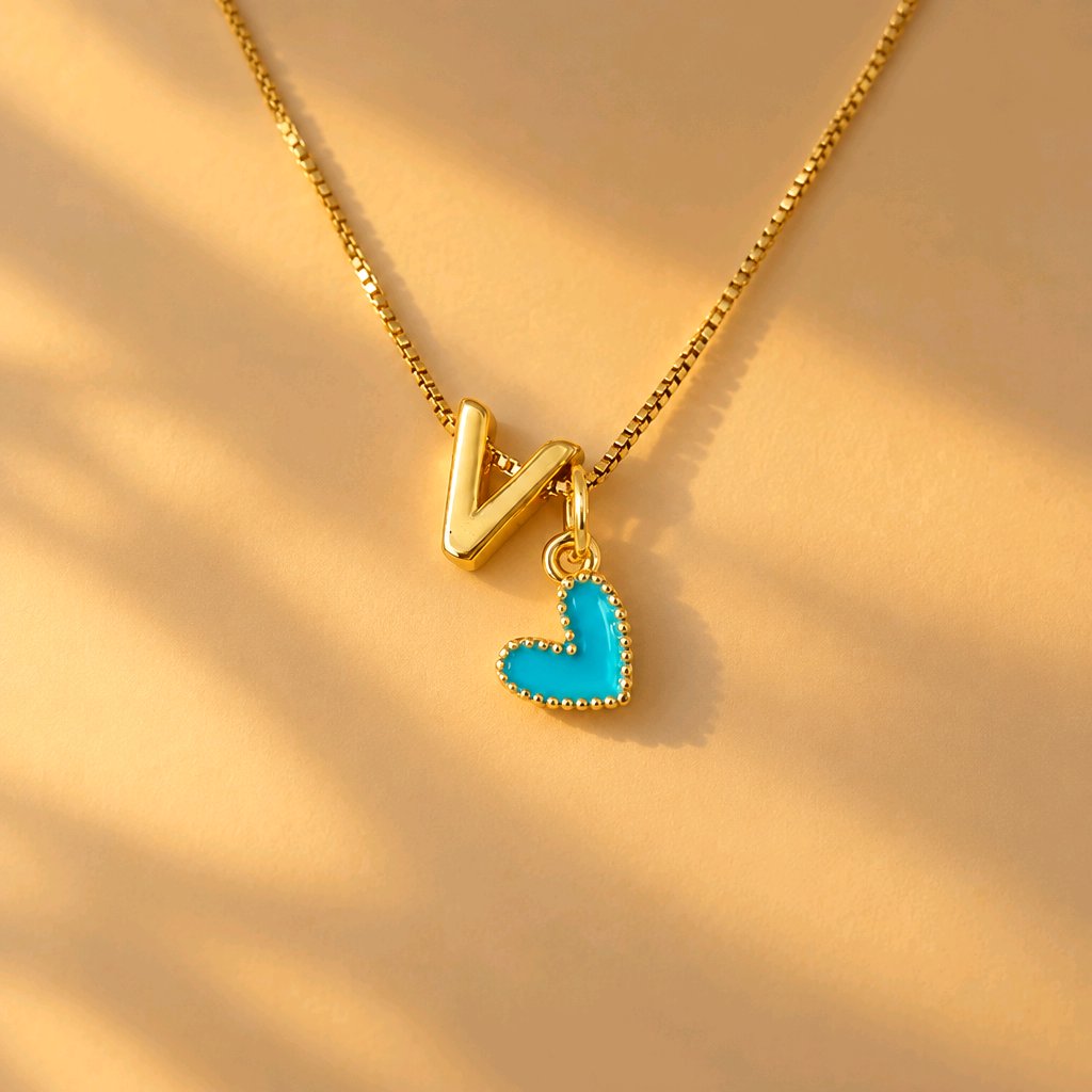 CADENA 1LETRA DORADA Y CORAZON JOLIE TURQUESA