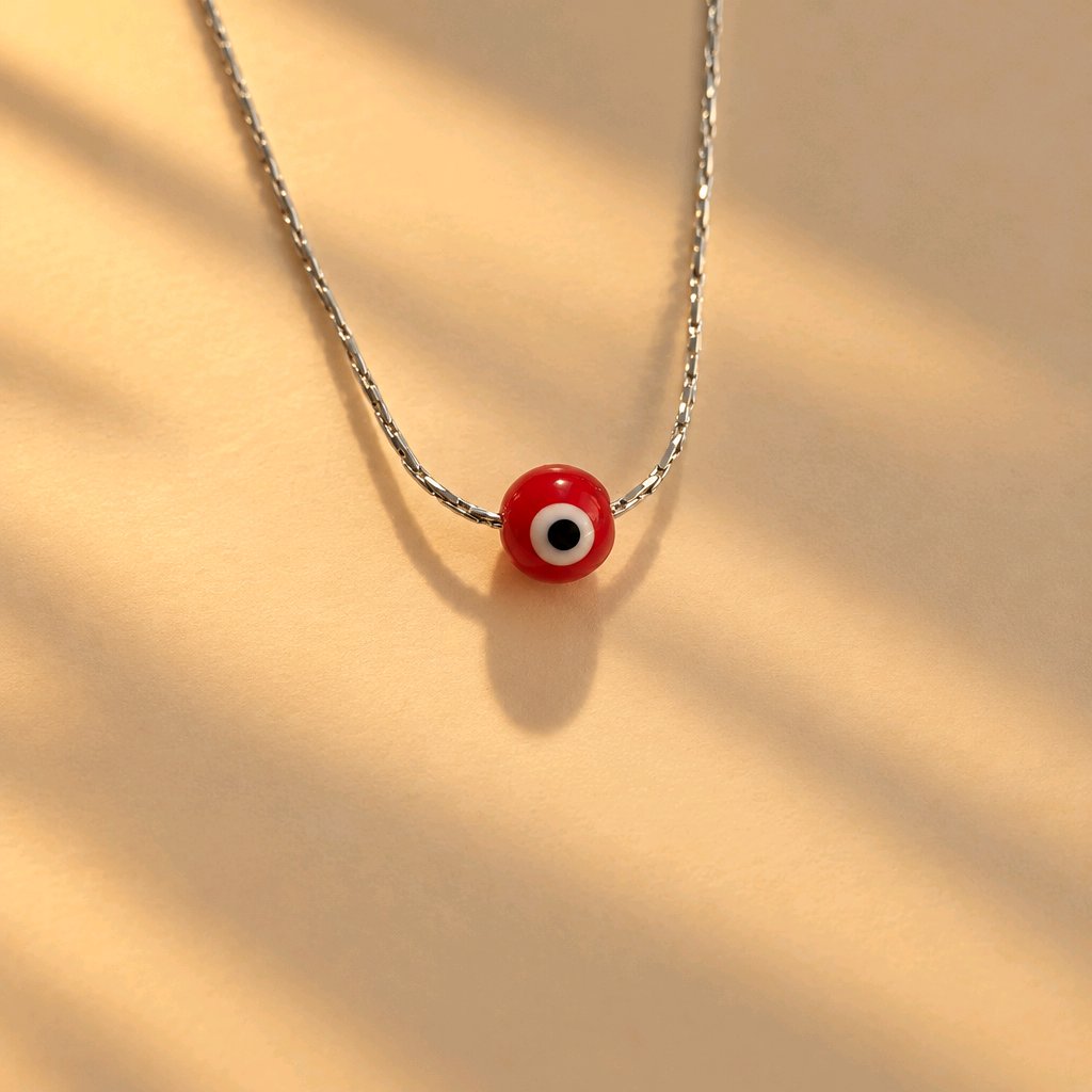 CADENA OJITO ROJO PLATA